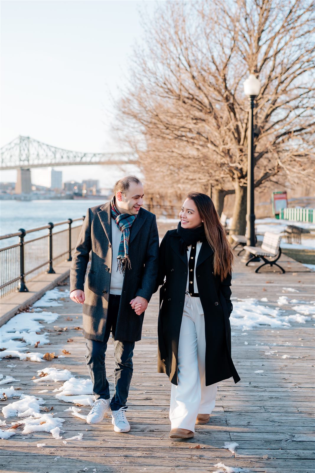 Manny and Arbie walking by the waterfront